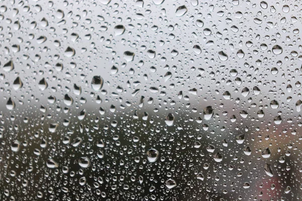 Падіння дощу на вікно — стокове фото
