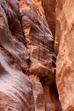 The walls of the Siq, narrow passage that leads to Petra, Jordan clipart