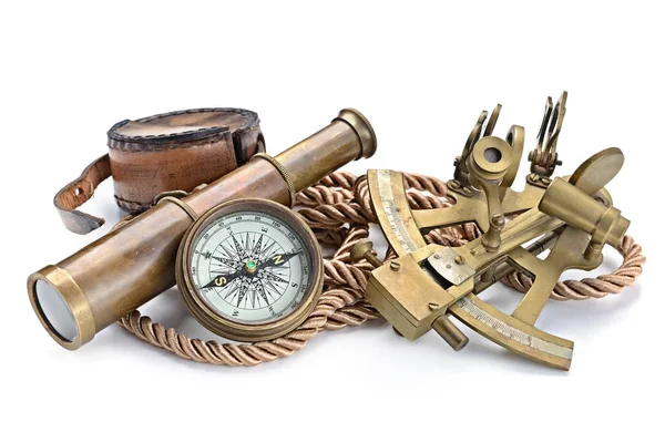 Compass,sextant and spyglass on the white — Stock Photo, Image