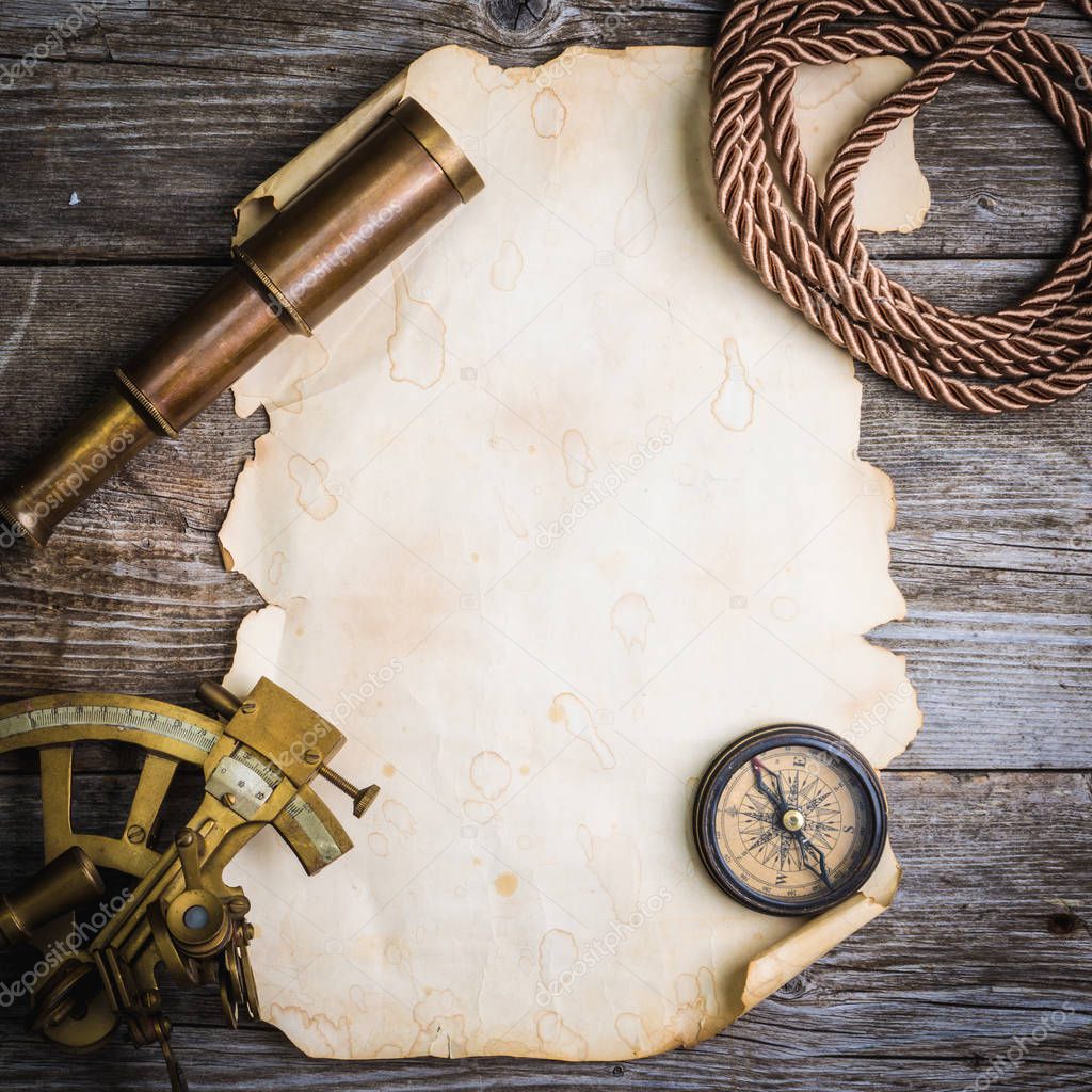 vintage still life with compass,sextant and spyglass