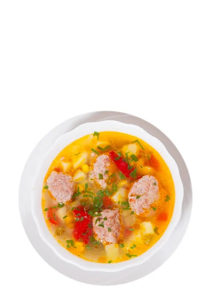 Soppa med köttbullar och grönsaker. ovanifrån. isolerad på vit — Stockfoto
