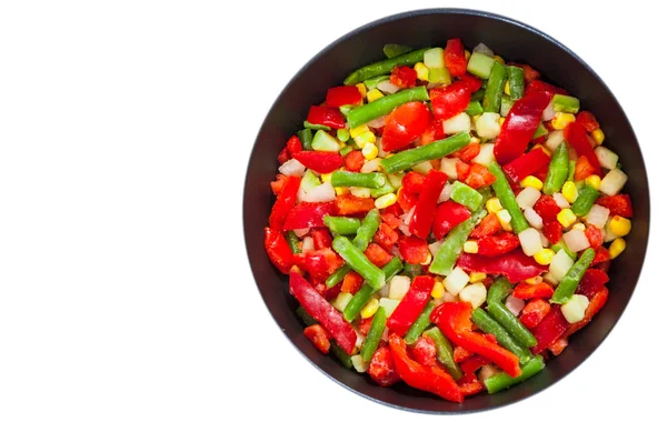 Mixed vegetables in a frying pan. top view. isolated on white — Stock Photo, Image