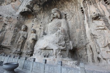 Luoyang The Buddha of Longmen Grottoes in China clipart