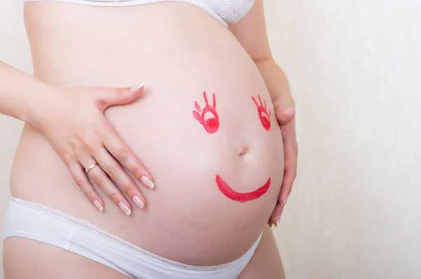 Belly of the expectant mother Royalty Free Stock Images