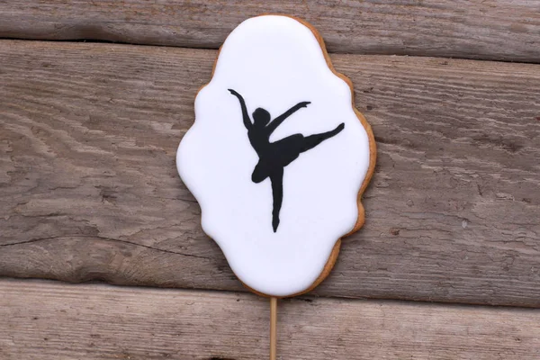 Cookies ballerina on wood background — Stock Photo, Image