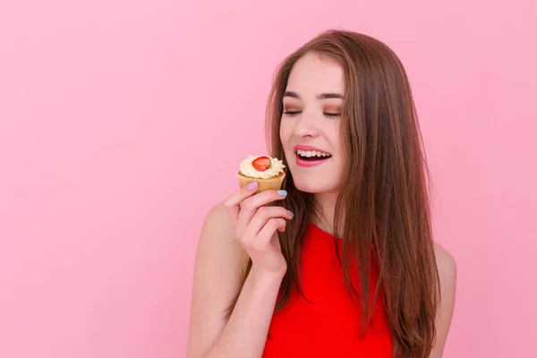 Tizenéves lány vidám szakács és cupcake Stock Fotó