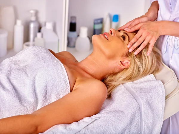 Woman middle-aged take face cleaning in spa salon. — Stock Photo, Image