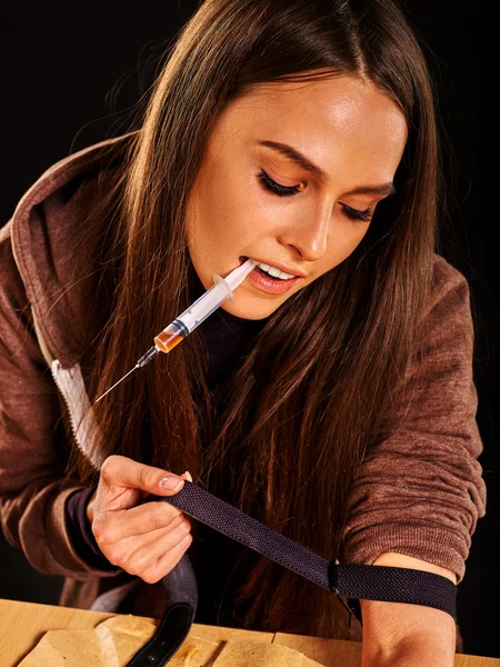 Female drug addict with syringe. Choice she has made. — Stock Photo, Image