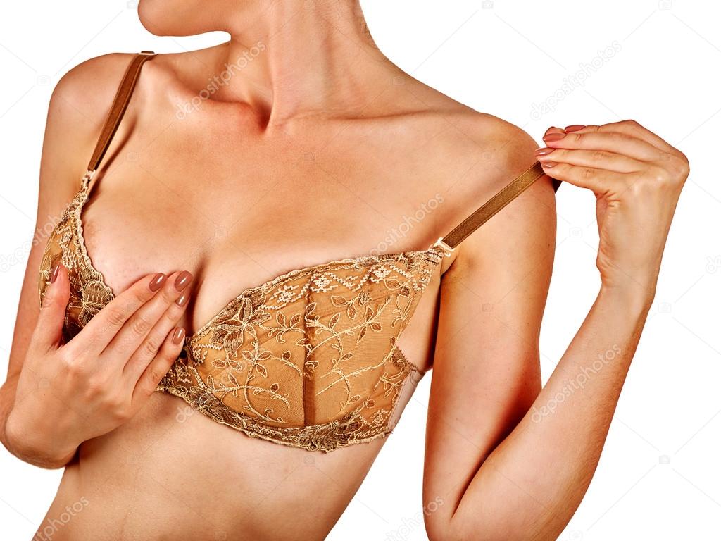 Девушка снимает нижнее белье, чтобы осмотреть грудь . стоковое фото ©poznyakov 127127612