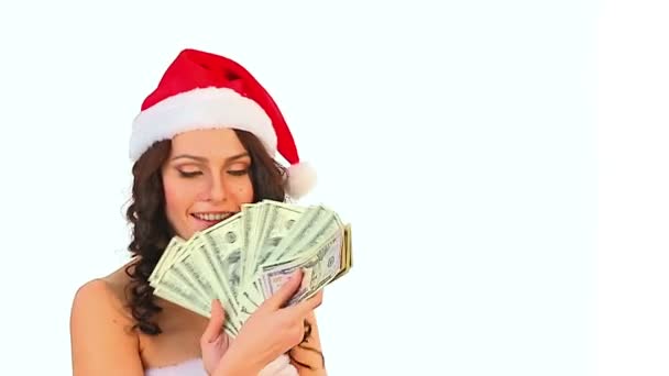 Mujer en Santa sombrero guarda dinero dólar . — Vídeo de stock