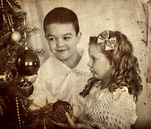 Retro Christmas portrait of children brother and sister