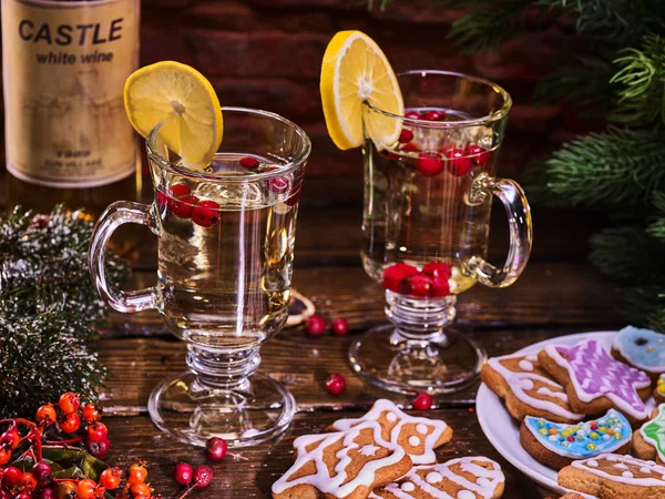 Christmas cookies plate and two glasses mug with bottle. — Stock Photo, Image