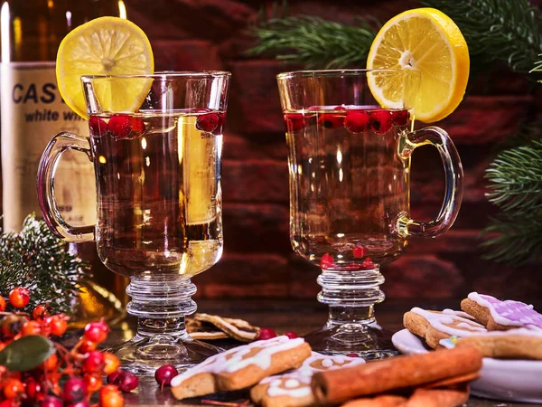 Christmas cookies plate and two glasses mug with cinnamon sticks. — Stock Photo, Image