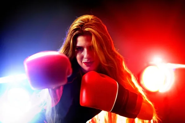 Boxing women fitness exercises in gym. Sport workout on ring .