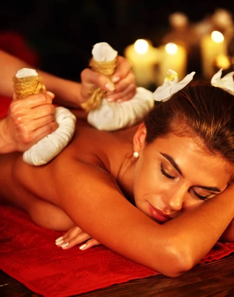 Massage woman spa salon. Female have herbs hot ball therapy. — Stock Photo, Image