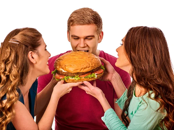 Grupa hamburger fast food z szynki w rękach osób . — Zdjęcie stockowe