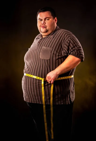 Man belly fat with tape measure weight loss around body . — Stock Photo, Image