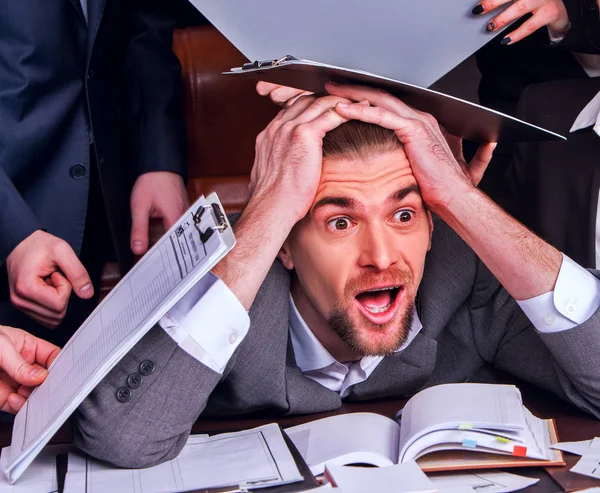 Business man in office.People are unhappy with their leader. — Stock Photo, Image