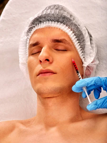 Dermal fillers of man in spa salon with beautician. — Stock Photo, Image