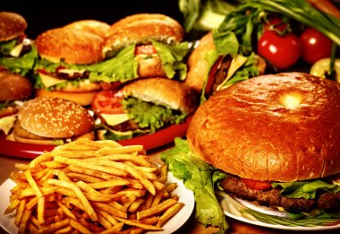 Fast food hamburger and french fries for large group friends. clipart