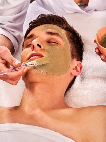 Mud facial mask of woman in spa salon. Face massage . — Stock Image Mud facial mask of woman in spa salon. Face massage . Stock Image