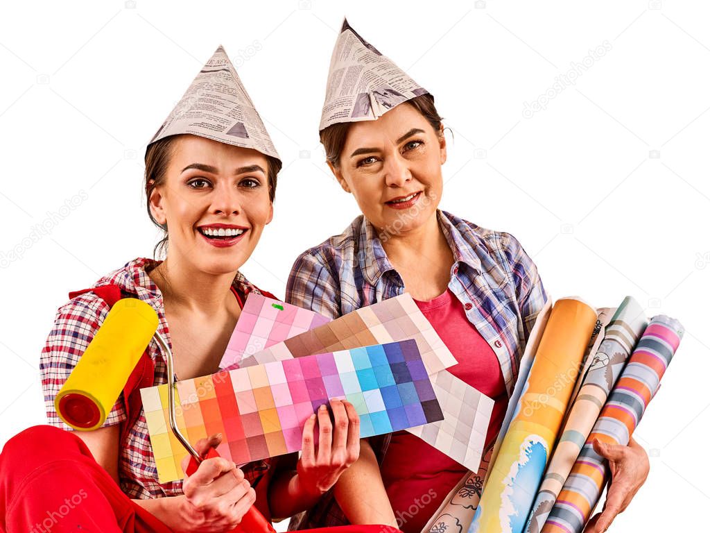 Repair home women holding Bank with paint for wallpaper.