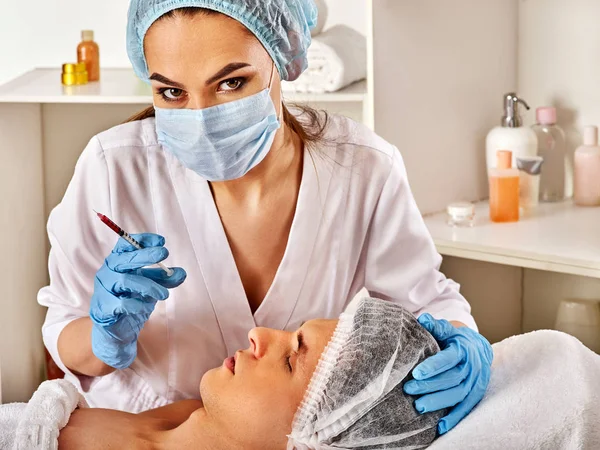 Dermal fillers of man in spa salon with beautician. — Stock Photo, Image