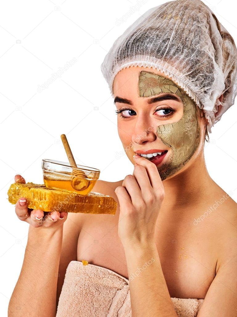 Facial honey clay face mask woman . Honeycombs homemade organic threatment.