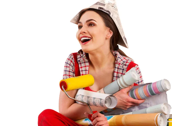 Repair home woman holding paint roller for wallpaper. — Stock Photo, Image