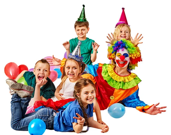 Birthday child clown playing with children. Kid holiday cakes celebratory. Royalty Free Stock Photos