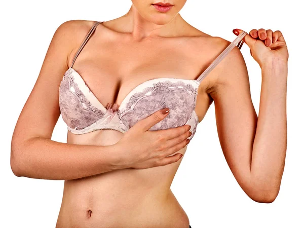 乳房自我检查的妇女。女人穿胸罩. — 图库照片