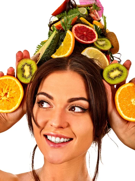 Hair mask from fresh fruits on woman head.