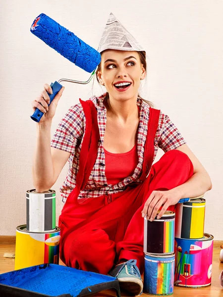 Repair home woman holding paint roller for wallpaper. — Stock Photo, Image