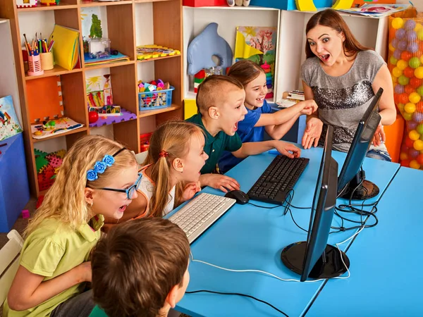 Children computer class us for education and video game. — Stock Photo, Image