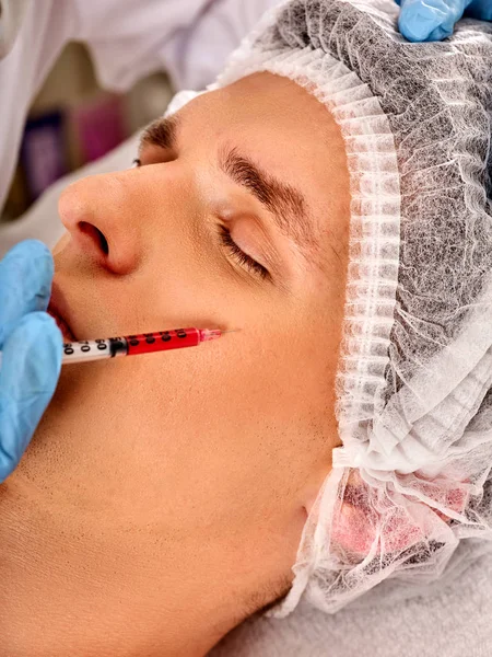 Dermal fillers of man in spa salon with beautician. — Stock Photo, Image