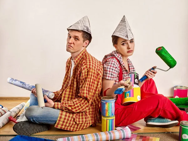 Repair family by happy couple building home. Quarrel family. — Stock Photo, Image