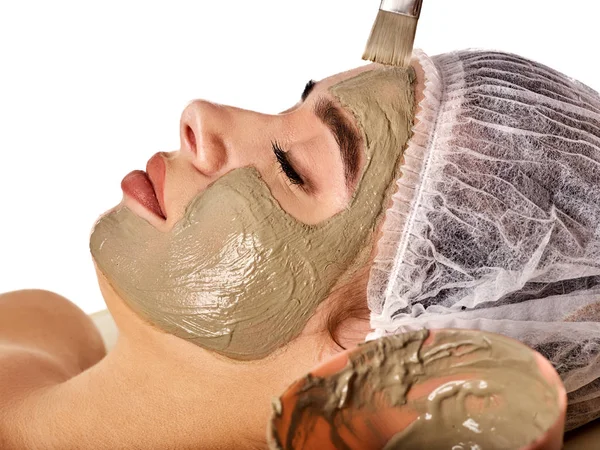 Λάσπη μάσκα προσώπου της γυναίκας στο κομμωτήριο spa. Μασάζ προσώπου . — Φωτογραφία Αρχείου