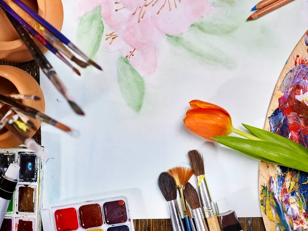 Authentic paint brushes still life on table in art class school. — Stock Photo, Image