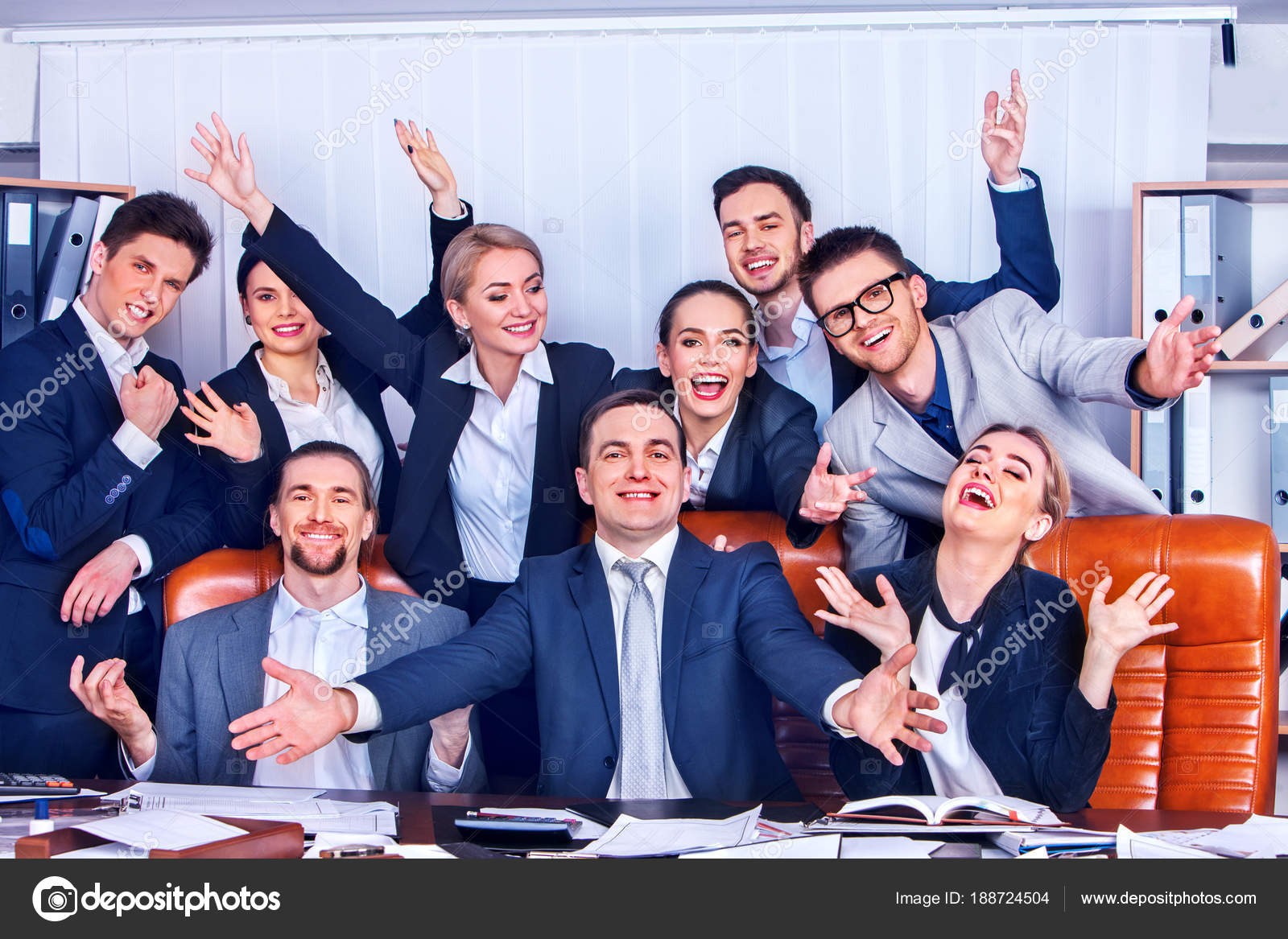 Business people office life of team people are happy with hand up . Stock  Photo by ©poznyakov 188724504