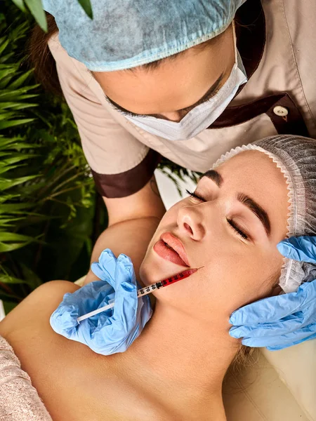 Dermal fillers of woman in spa salon with beautician. — Stock Photo, Image