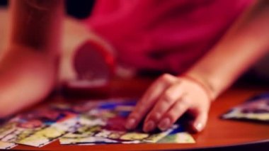 Hand holding and sorted photo with love story pictures