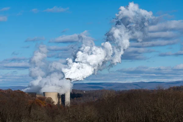 Clouds of steam and smoke from coal powered station — Stock Photo, Image
