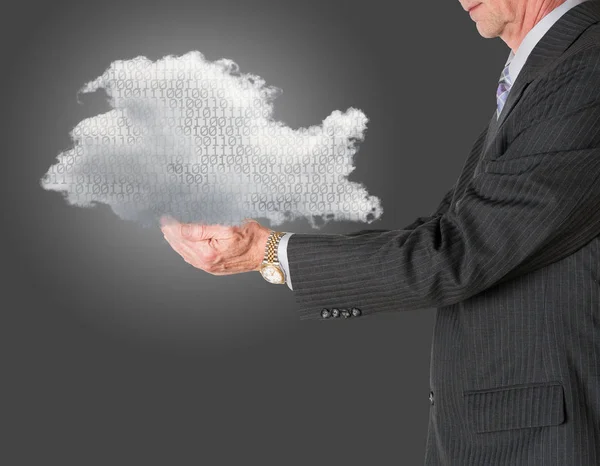 Senior manager holding cloud computing — Stockfoto