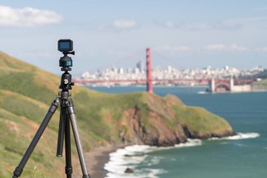 Camera taking timelapse of San Francisco clipart