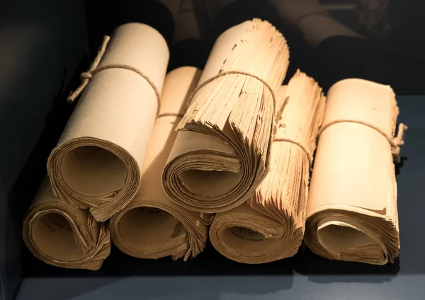 Rolls of old yellowed books and papers — Stock Photo, Image