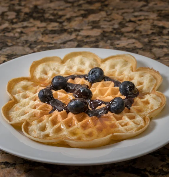 Norwegian waffles on plate with blueberries — Stock Photo, Image