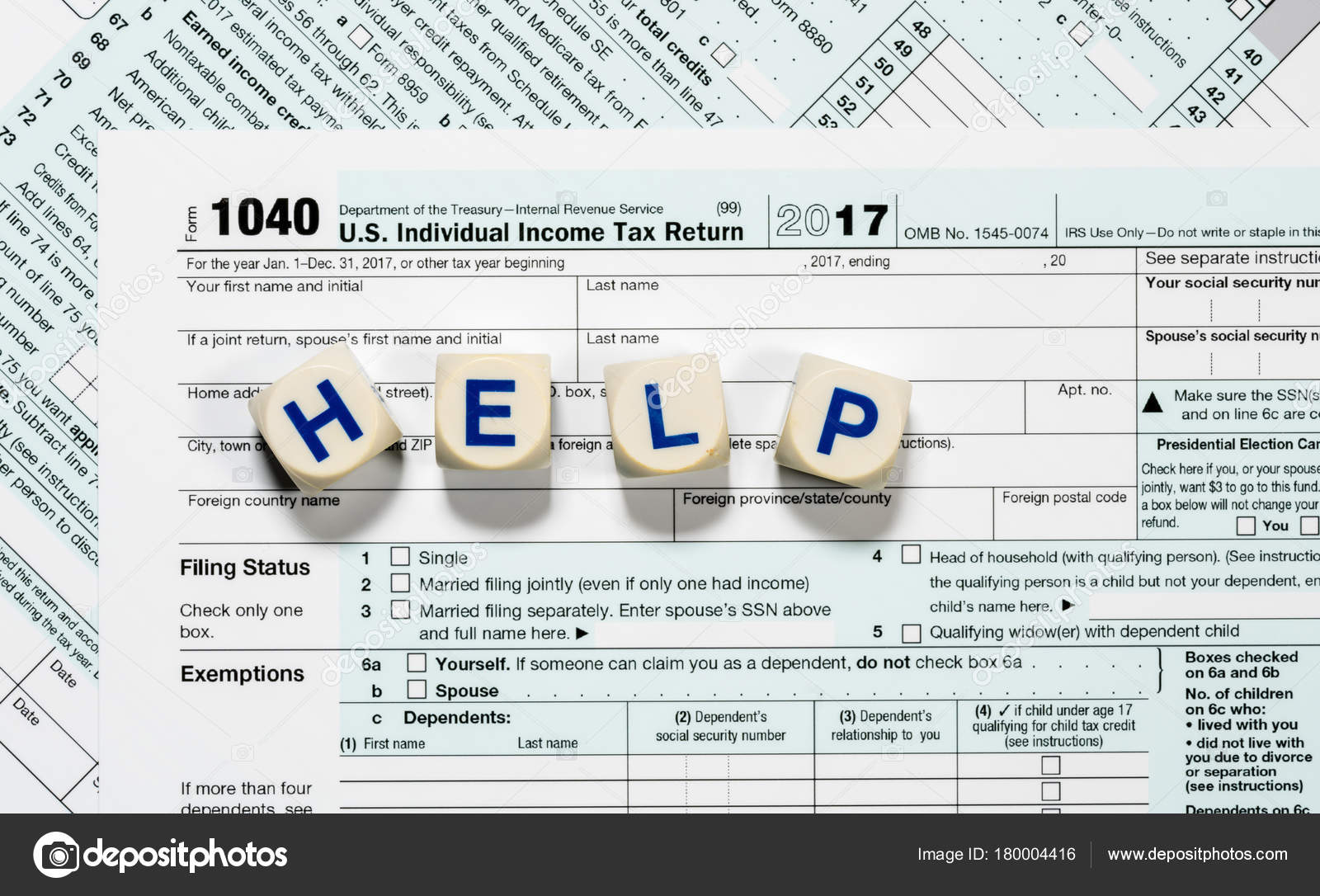 Macro close up of 9 IRS form 9 with HELP letters ... Macro close up of 9 IRS form 9 with HELP letters ...