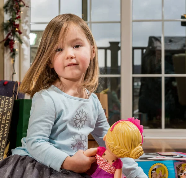 Young female caucasian girl opening presents — Stock Photo, Image