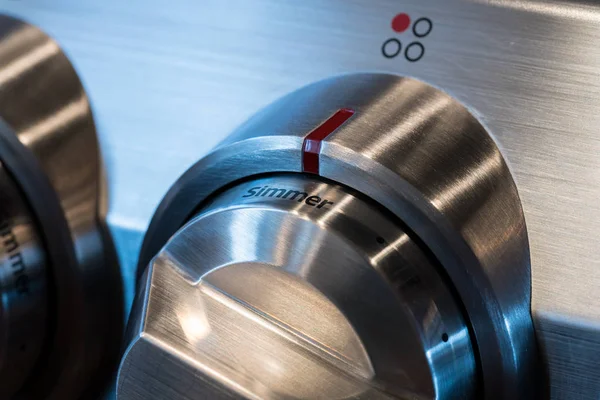 Stainless steel control knob on cooker — Stock Photo, Image