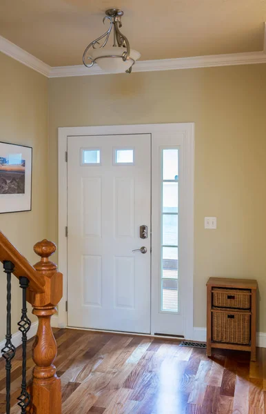 Front door and hall with wooden floor — Stock Photo, Image